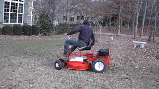 1967 Snapper Comet 26 riding mower mulching leaves.