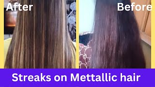 streaks on  metallic hair||base  color change with highlights