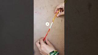 "Crafting Eco-Friendly Rakhi with Rice: A Creative DIY Tutorial | Short Video"