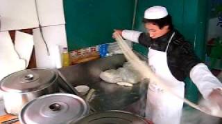 Noodle preparation in local Muslim restaurant