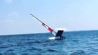 Gabbe capsizing his Catamaran