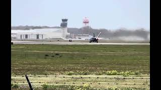 A pair of FA-18 hornets launching