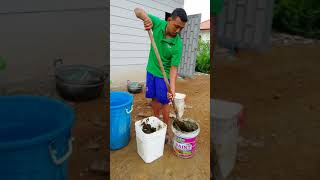 Cambodia students mix cow dung to get biogas for cooking