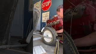 Getting a tubeless wheel barrel tire to go back on the bead #diy #lifehacks