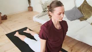 Woman Doing Yoga in Living Room