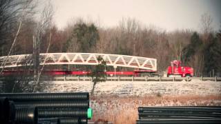 MAADI Group: Nouvelle passerelle pour motoneige en aluminium traversant la rivière Coaticook