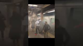 Brooklyn New York 4/12/2022, People run away from subway smoke from sh**ter