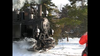 Vintage steam train in the winter landscape.  Children Railway, Budapest