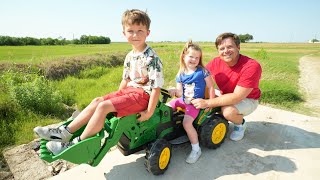 Using kids tractors on the farm to clean hay field | Tractors for kids