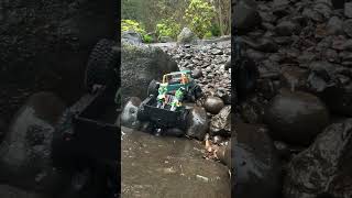 Trx4m yj wrangler crawling with a trailer.