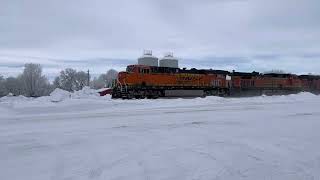 BNSF 8277 leads grain train south with EX BNSF C44-9W