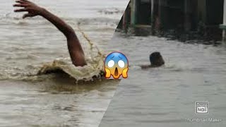 A yasuh nice, Man back flips in flood water like its a pool!!!