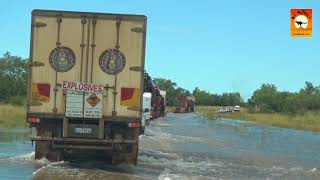 Following massive road trains through flooded waters in outback Australia - OzOutback Truckers