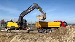 VOLVO EC220E NH loading IVECO EUROTRAKKER with gravel part 4 - Manzano, Italy