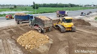 Wonderful, Bulldozer SHANTUI Pushing Sand & Stone For Filling And Truck 5T Unloading Stone