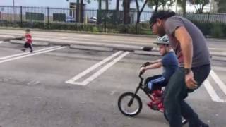 Elijah learning to ride a bike