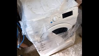 BRAND NEW Indesit Washing Machine that fell off the back of a lorry - QUITE LITERALLY!