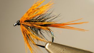 Tying a burnt orange Kate Mclaren tutorial