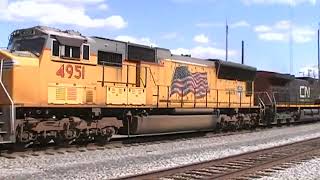 Canadian National Union Pacific Power Lead A CSX Tank Car Train.