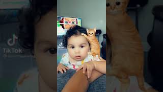 baby girl playing with cartoon cat 😍😍