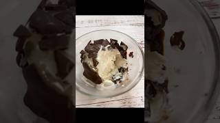 Ice cream frosted with dark chocolate