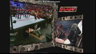 Edge splashes Matt Hardy through table