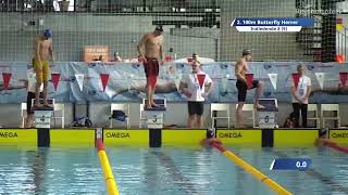 Casper Puggaard fra Hovedstadens Svømmeklub svømmer juniorrekord på 100 meter butterfly