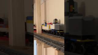 Aerial Lego train.   Repaired.   Slightly improved.  2 locos.  9 cars.  2kgs train weight