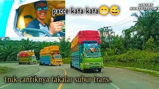 truk muatan overload lintas beriringan di tanjakan berkelok...