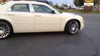 2006 Chrysler 300 sitting on 22" Versante 230 Chrome Wheels and 265/35-22 Lexani Tires.