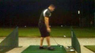 Fred Groth Cranking Away at Driving Range