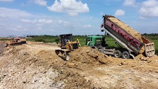 Best project heavy Dozer working push soil with heavy dump truck unloading soil Filling Up.