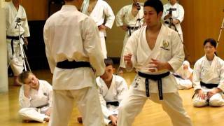 Sensei Yamaguchi and sensei Nagaki demonstrates ushirogeri with block and counter