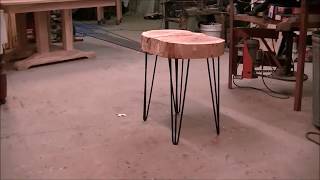 How to build a simple side table with hair pin legs. Chain saw and a drill.