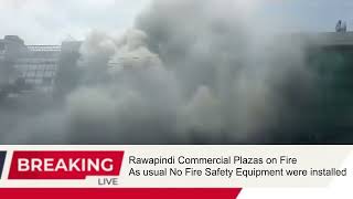 Teenage worker dies in Rawalpindi plaza blaze At least 25 shops gutted in fire caused by