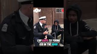 cop raps to young kid in the hood