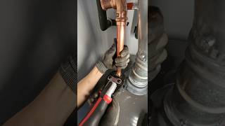 Piping up waterlines on a water heater with the M12 Force Logic 💦 #plumber #plumbing #diy #asmr