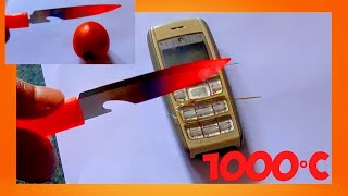 Glowing 1000 degree knife vs Nokia phone 2300 and Everything