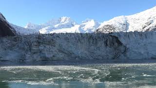 an iceberg is created.   The Glacier Bay national park.