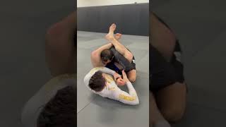 Sneaky shoulder lock from closed guard