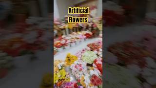 A man-made Flowers inside mall #departmentstore #flowershop #flowerdesign