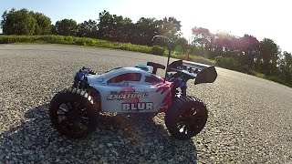 Exceed Blur 1/16th scale nitro buggy on road.