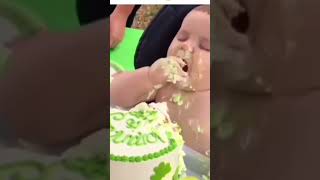 How cut he was eating cake with sleeping #cute #baby #shorts #viral