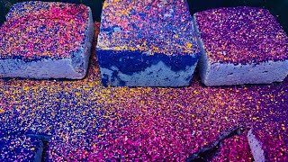 Holi powder pasted block with the holi powder and gym chalk reforms topped with more holi powder 💜🩷