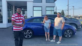 An Awesome Car For An Awesome Couple! Proud New Elantra Owners from Hyundai of Seattle!