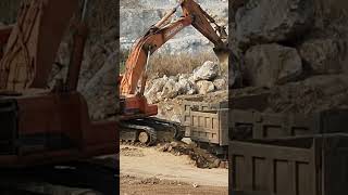 Daewoo 370LCV Excavator load soil onto dump truck #excavator #daewoo #quarry #mining