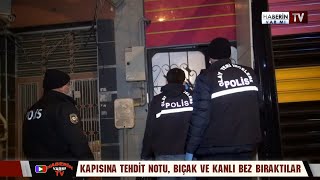 Daire kapısına tehdit notu, bıçak ve kanlı bez bıraktılar..