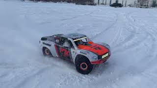 Traxxas UDR Fun in the Snow! Stock tires vs Proline Hyrax - Which are Better?