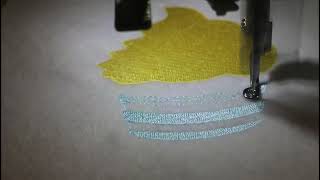 Embroidering a cupcake large felt story on Janome memory craft 500e