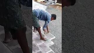 Art of Interlock Tile Laying by Skilled Workers